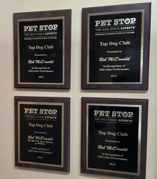 Four Pet Stop Top Dog Club plaques presented to Rob McDonald for 2022, 2023, 2024 and 2025