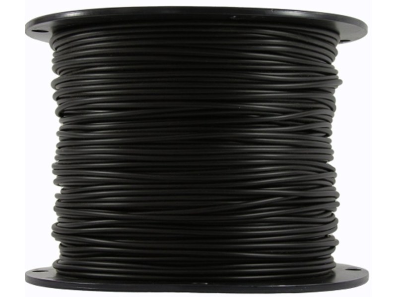 Spool of black boundary wire used for electric dog fence installation